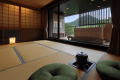 【桜の間】広めの畳スペースに茶釜が特徴の露天風呂付き客室