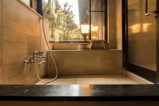 [TSUKUSHI] Separate room with a half open-air bath and free-flowing hot-spring water / Japanese-style room 10 + 6 tatami mats / Villa Size: 40 m&sup2;