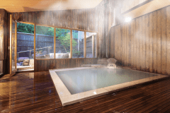 【大浴場／内湯】あたたかな木造りの雰囲気が漂う大浴場。「蔵王岩の露天風呂」付き、24時間入浴可能