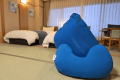 【大観和室（２ベットタイプ）】お部屋から日本海を一望できる和室２ベットタイプ。雄大な絶景と水平線に沈む夕陽がご覧いただけます。
