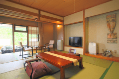 【２階客室一例】デザイナーがコーディネートした趣深い客室。各客室に専用の露天風呂をご用意しております。