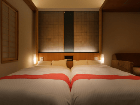 Twin bedroom with open-air bath