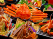 A luxurious crab banquet featuring seasonal flavors, using 2.2 crabs per adult.