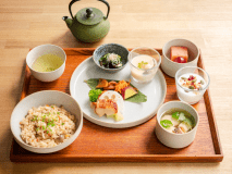 "A fragrant mushroom rice dish made with 'Ginga no Shizuku' brown rice from Shizukuishi, Iwate Prefecture. The plate is a luxurious offering of autumn's seasonal flavors, including chawanmushi (savory egg custard), ohitashi (boiled greens), miso-marinated chicken, and a clear soup with white fish and grilled green onions.

For dessert, we offer Iwaizumi yogurt with seasonal fruits."