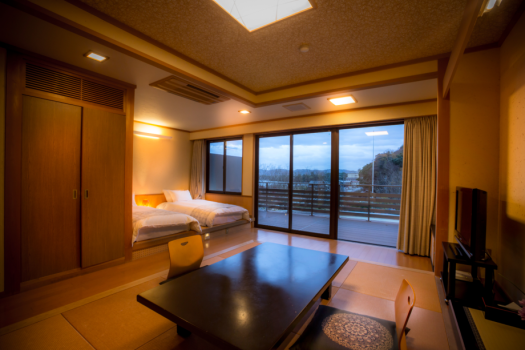 Japanese and Western room with terrace overlooking Amanohashidate and the sea.
