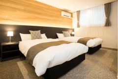 新館のデラックスツインルームになります。ごゆっくりとおくつろぎいただけます。
