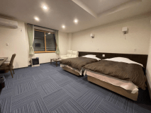 道路・駐車場側／別館スタンダードツイン