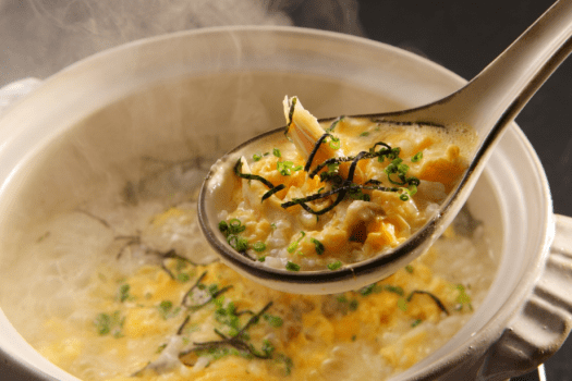 【ふぐ料理】ふぐ鍋の〆はもちろん出汁の旨味を吸った雑炊をどうぞ