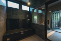 Corvo de Ouro with an open-air bath resembling a treehouse. Corvo de Ouro with an open-air bath resembling a treehouse.