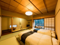 【本館】和室8畳ツインベッド付き　（客室一例）