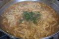 【〆のうどん】ごぼうの香ばしさと味噌の深いコク、卵のまろやかな風味が調和した一品です