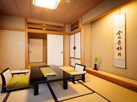 Japanese-style room (8 tatami mats + next room) with bath and toilet