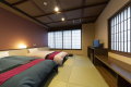 Compact Twin Room with Shared Bath Compact Twin Room with Shared Bath
