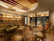 Premium lounge “BASE” studded with Hida wooden furniture. Surrounded by the warmth of wood and chairs that have been carefully selected.