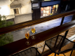 Enjoy the breeze on the terrace of the premium lounge while sipping a drink and looking out over the city.