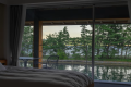 [Dawn] A second-floor bedroom with a terrace overlooking Amanohashidate and the canal.
