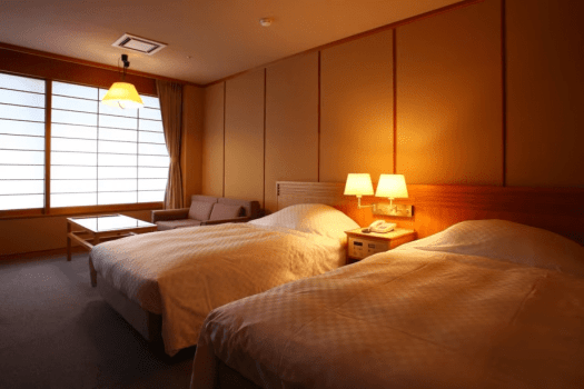 [Luxury twin room with spa living room, 60 square meters (mountain side)] The bedroom is next to the living room, making for a spacious room.
