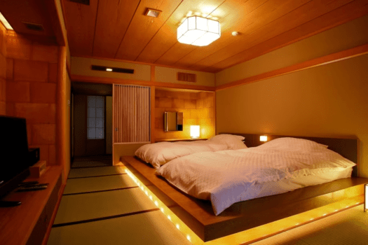[Western-style room, 56 square meters] A modern room with tatami flooring and a floor bed.
