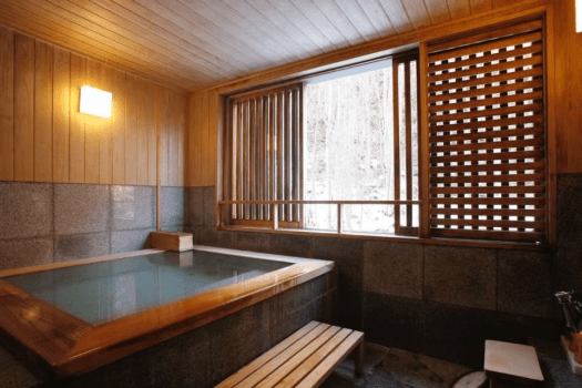 [Japanese-Western double room with panoramic bath (60 square meters)] Equipped with a panoramic bath made of granite and fed directly from the hot spring.