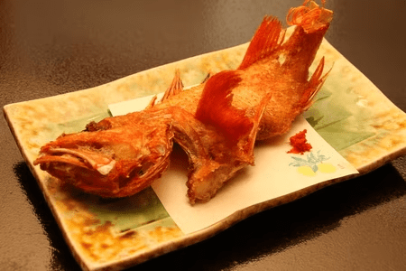 Ichinomatsu&rsquo;s signature deep-fried rockfish &mdash; crispy on the outside, tender inside, and flavorful down to the bones.