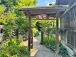 夏の草円玄関