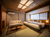 【和モダン客室・タイプB】2人掛けソファ、シモンズベッド、ワーケーションデスクや50インチのスマートTVのある新客室