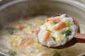 〆は、かにの旨味が凝縮した出汁で作ったかに雑炊を！