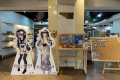 売店の前で観覧頂ける温泉むすめ下呂美月ちゃん。望川館にしかない声優さんのサイン入り下呂美月パネルと望川館の浴衣を着た下呂美月ちゃんパネル