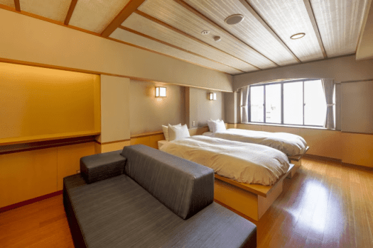 最上階オーシャンビュー露天風呂付きユニバーサルルーム和洋室ベッドルーム54平米