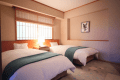 【禁煙】バリアフリー温泉付特別室　ツインベッドルームの様子。バリアフリー使用ですが、もちろん一般のご利用でも快適に過ごして頂けます。