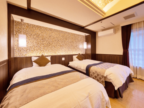 クラシックツインルーム。寝心地抜群のシモンズベッド