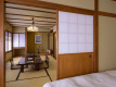 【二間付和ベッド客室】広々としていて落ち着きのある客室です。
